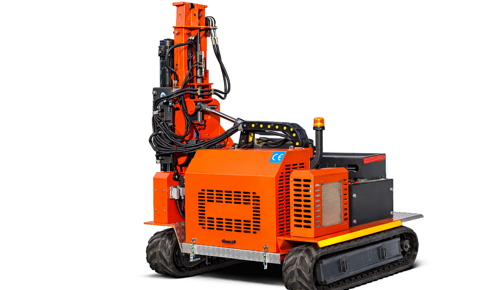 A small, orange and black drilling rig against a black background, likely used for construction or mining purposes.