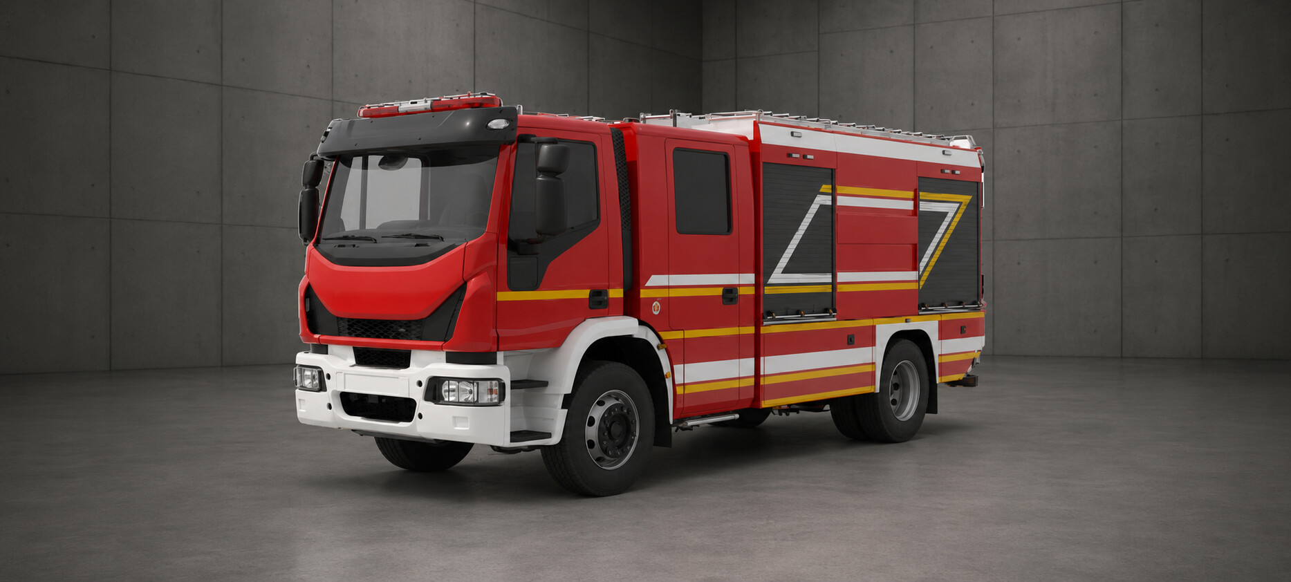 A red and white fire truck parked in a dimly lit room with gray walls.