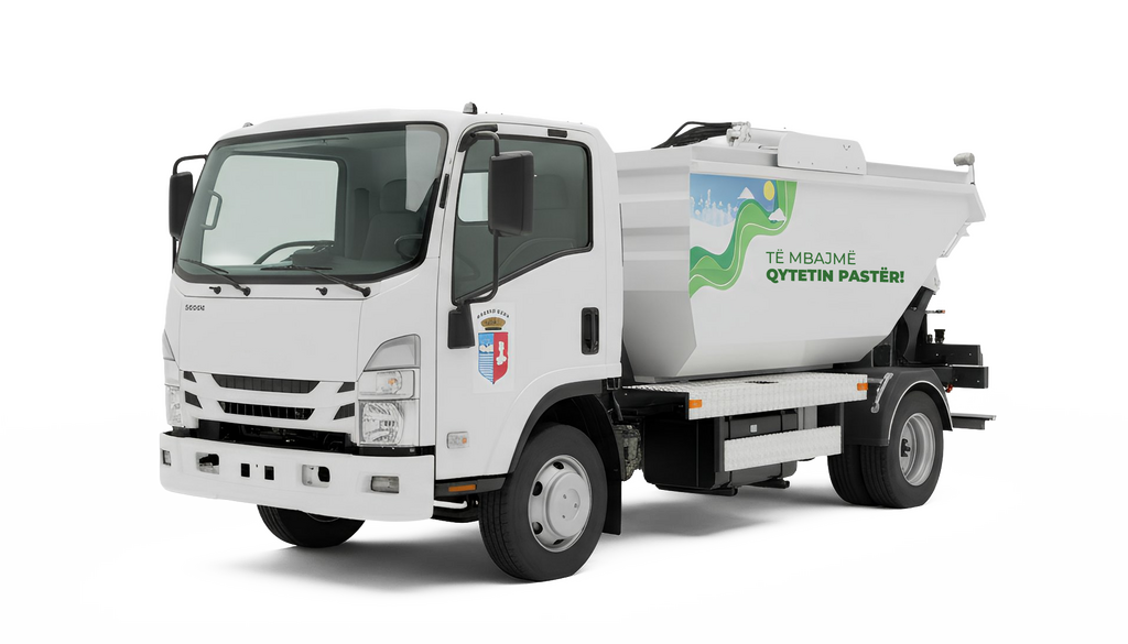A white garbage truck with a large container on the back, parked on a solid black background. The truck's front is visible, with the container extending to the right side of the image. The truck's windshield and side mirrors are also